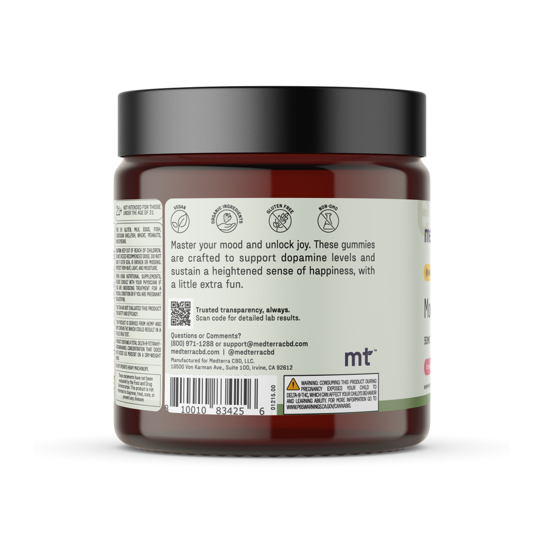 A dark amber jar with a black lid is displayed, containing Medterra Mood Boost CBD Gummies. The label highlights the product's purpose: boosting mood and dopamine levels for increased happiness. Infused with CBD and saffron, it provides a holistic approach to wellness. Contact details and a QR code for detailed lab results are included.