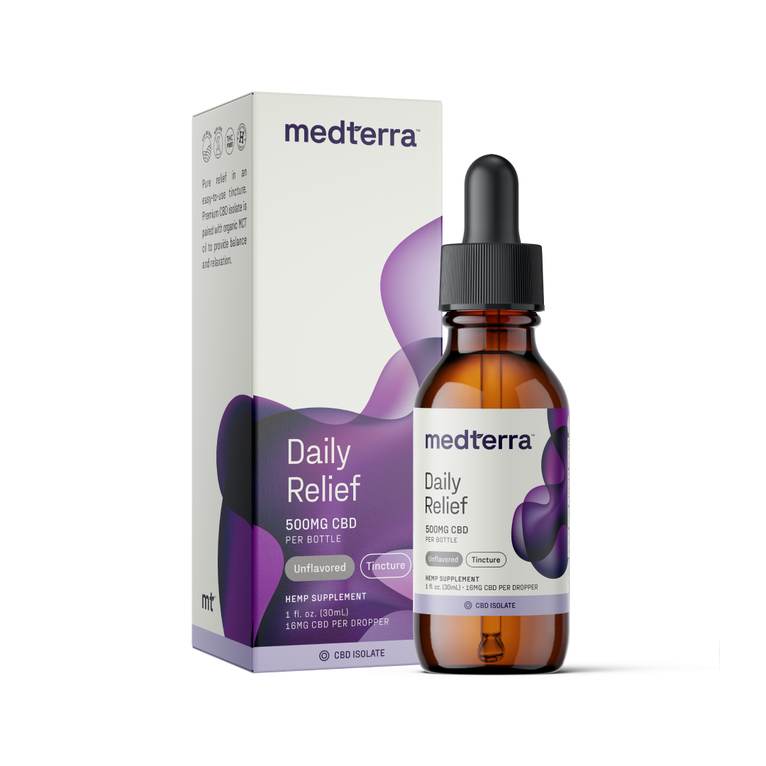 A box and a bottle of Medterra Daily Relief CBD Isolate Oil are shown side by side. The white box, adorned with purple and blue abstract designs, indicates 500mg of isolate CBD per bottle. The brown glass bottle features a dropper cap and showcases a similar label design as the box, ensuring consistency.