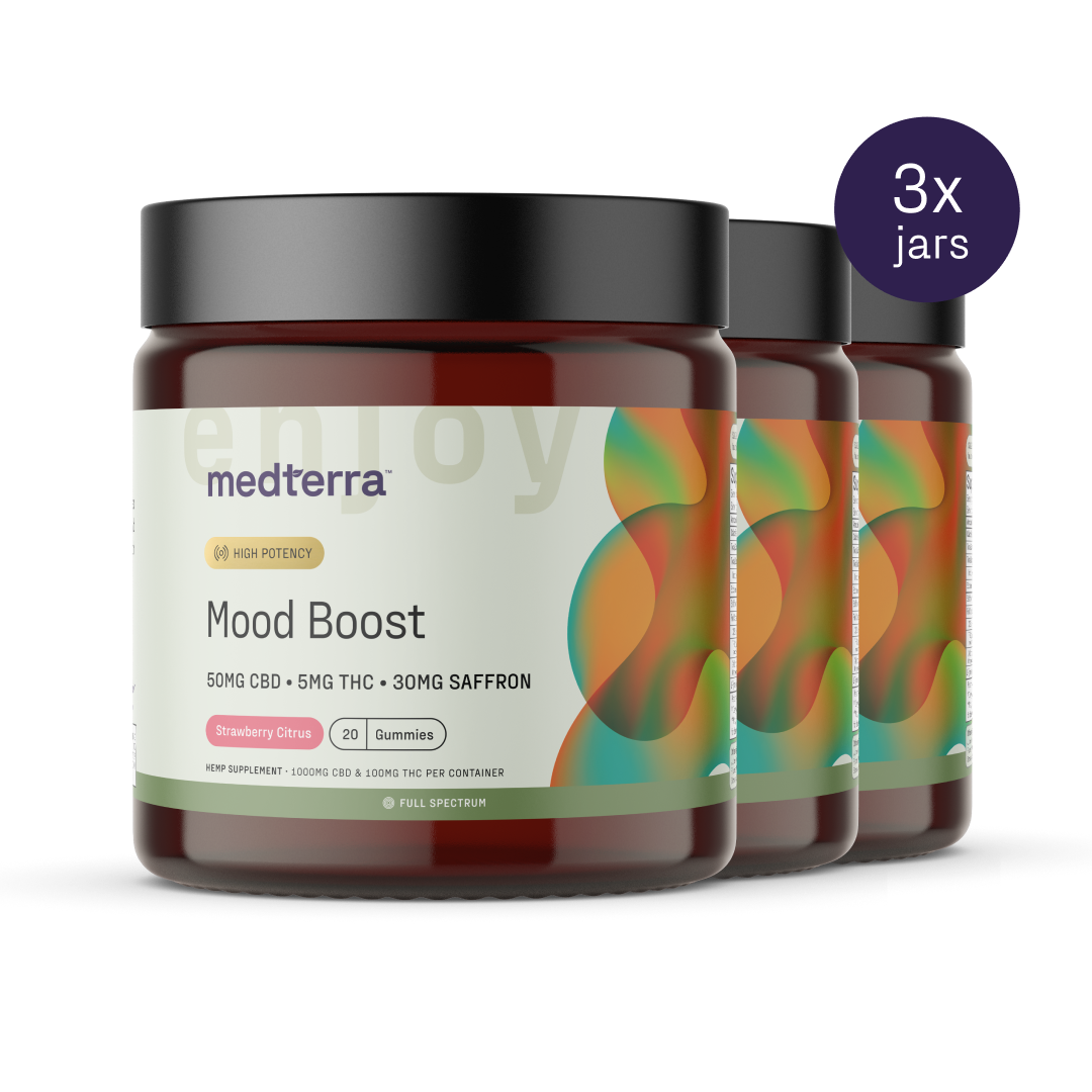 Three jars of Medterra Mood Boost CBD Gummies are displayed, labeled as "High Potency" with 50mg CBD, 5mg THC, and 30mg saffron per gummy. The flavor is Strawberry Citrus. A purple label indicates the pack contains "3x jars." The jars have a modern, colorful design perfect for elevating your mood.